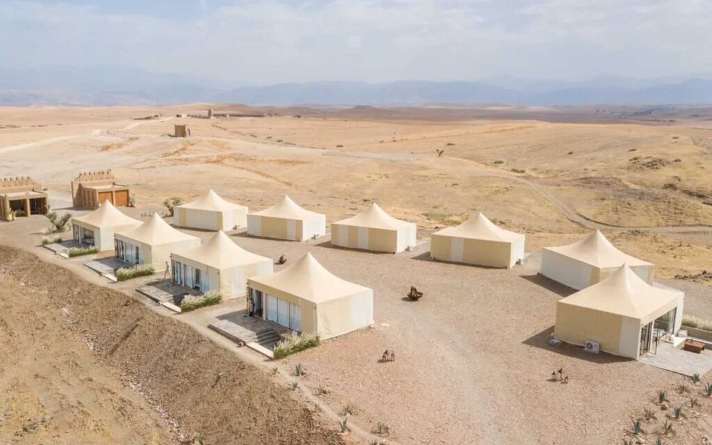 A campsite with 10 large tents in the Agafay Desert.