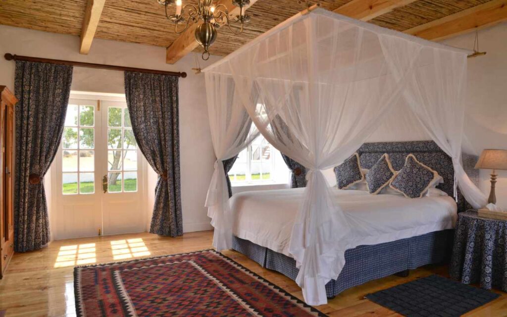 Four poster bed inside luxury accommodation.