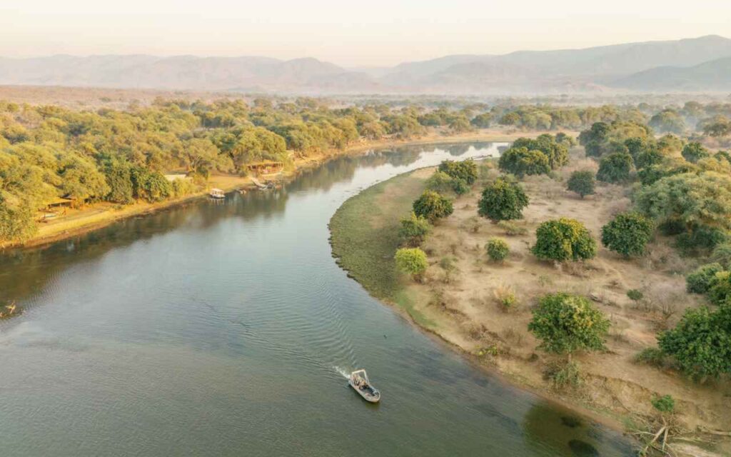 A boat travels along Chongwe river, Zambia.